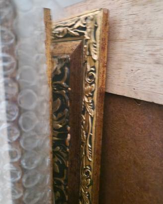 SPECCHI CON CORNICE DORATA STILE BAROCCO.