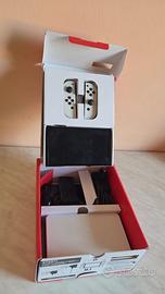 nintendo switch oled immacolata prezzo SHOCK