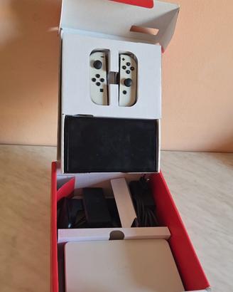 nintendo switch oled immacolata prezzo SHOCK