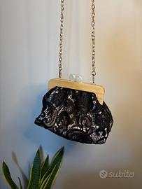 Borsa clutch in pizzo