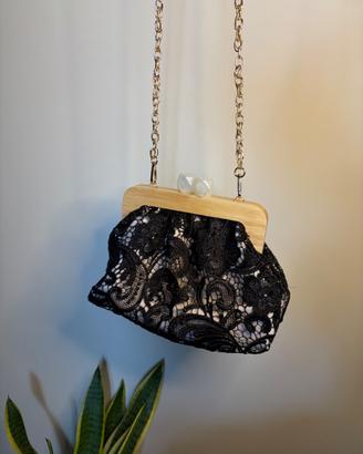 Borsa clutch in pizzo