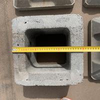 Canna fumaria e comugnolo in cemento