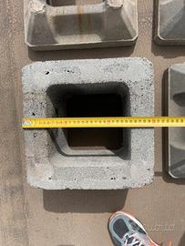 Canna fumaria e comugnolo in cemento