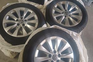 QUATTRO CERCHI IN LEGA ORIGINALI + GOMME QUATTROST