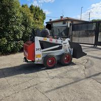 P180-Mini Pala Bobcat 313
