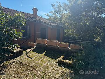 Villa a schiera con bosco