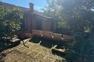 Villa a schiera con bosco