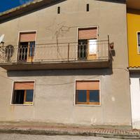 Doppio fabbricato con terreno