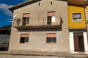 Doppio fabbricato con terreno