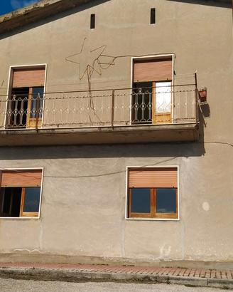 Doppio fabbricato con terreno