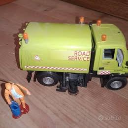 CAMION IMMONDIZIE + OMINO