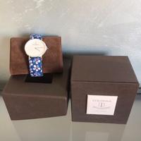 Orologio  Colonna particolare per donna.Originale.