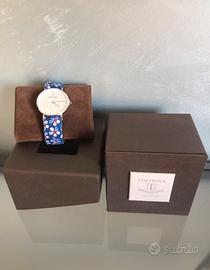 Orologio  Colonna particolare per donna.Originale.