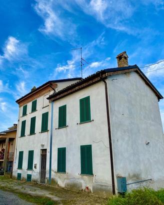 Cascinale con terreno a corpo