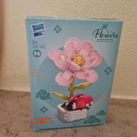 Costruzioni mattoncini fiore e coccinella 