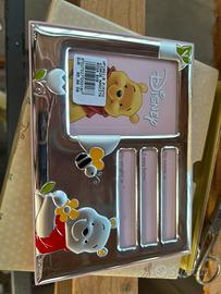 Cornice winnie in argento e nato rosa