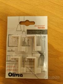 Ganci  per astine tende senza forare la finestra 