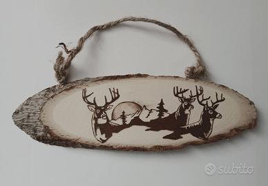 Insegna ovale con cerci