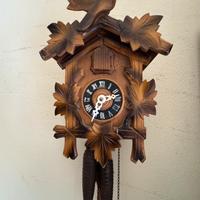 Orologio a cucu’ meccanico con catene
