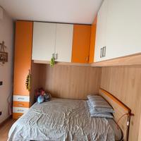Cameretta con letto a una piazza e mezza