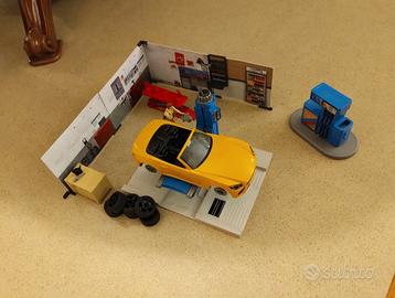 Officina meccanica con pompa di benzina Bruder