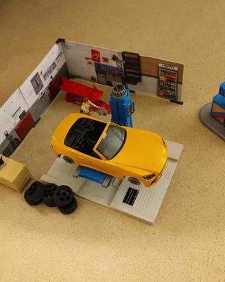 Officina meccanica con pompa di benzina Bruder