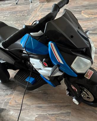 Moto elettrica per bambini blu e nera + caricatore