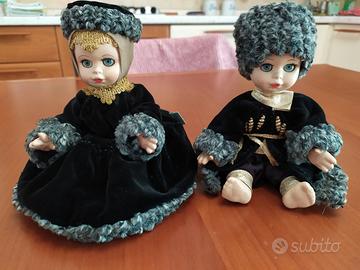 Coppia bambole porcellana Cleò Faenza, vestiti in