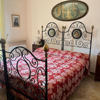 Letto Antico  ferro battuto con capezzale 300€