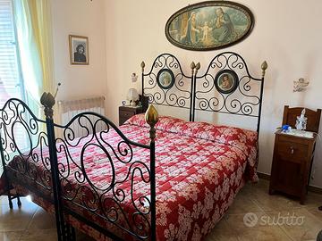 Letto Antico  ferro battuto con capezzale 300€