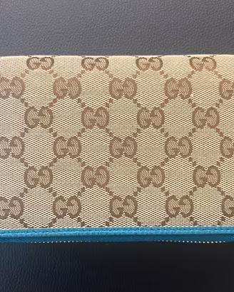 Portfoglio Gucci Zip-Around in Tela GG Original