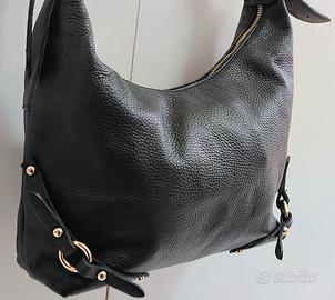 Borsa da donna vera pelle colore nero firmata.