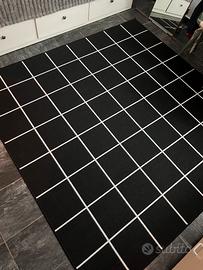 Tappeto, quadro e cuscini