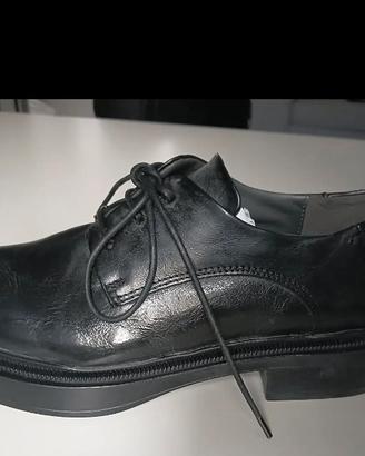 scarpe in pelle artigianali tipo polacchino 
