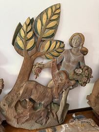 Sculture in legno da appendere