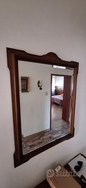 Specchio rettangolare con cornice sagomata