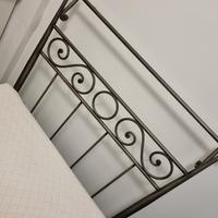 testata letto in ferro battuto grigio