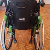 Carrozzina con cuscino anti decubo