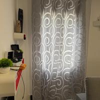 Coppia di tende + pali