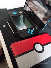 Nintendo New 2Ds XL  con cover Pokeball