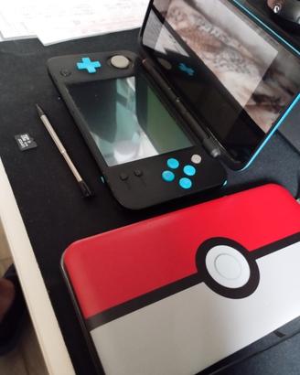 Nintendo New 2Ds XL  con cover Pokeball