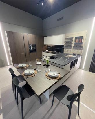 Cucina ArDue effetto resina con penisola e tavolo