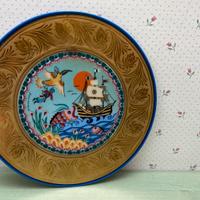 Piatto decorativo in fine porcellana