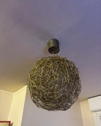 Lampadario in acciaio intrecciato