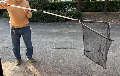 Guadino da pesca con manico telescopico