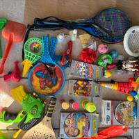 Giochi vari per bambini ( pistole acqua, palette,e