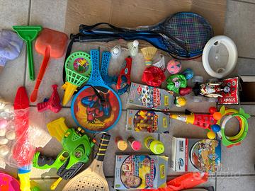 Giochi vari per bambini ( pistole acqua, palette,e