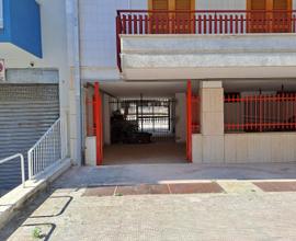 Locale Pilotis-posto auto