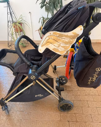 Cybex trio Platinum Priam Wings by Jeremy Scott