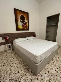 Casa con giardino